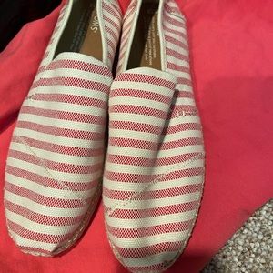 Size 10W Toms slip on’s